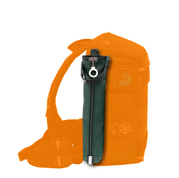 Detail of a dark Forest Green cane pouch attached to the side D rings of a City Block backpack, located directly behind the side pouches. There is a snap strap which has ajustable length to use as a lid closure or a handle on the pouch