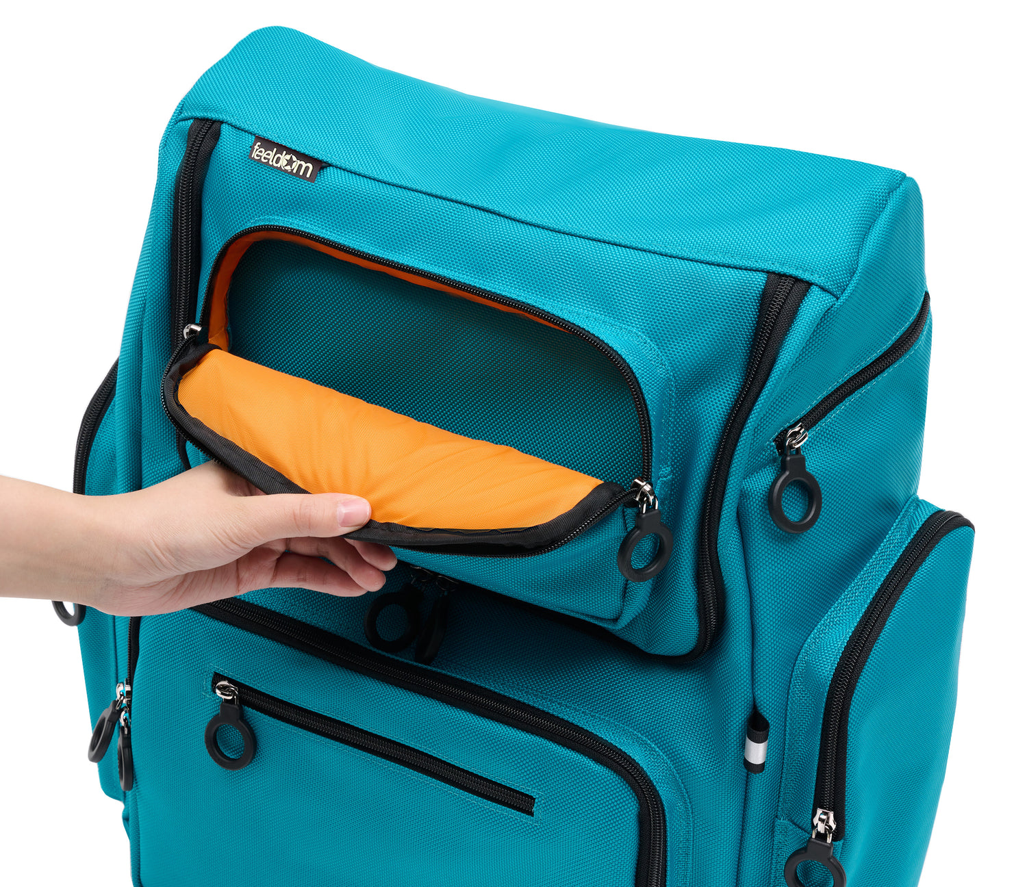 An aqua blue wheelchair bag with black trim and orange lining.