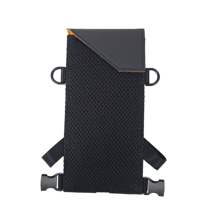 The backside of the Navi-Flip has a breathable air mesh padded back and an angled flap that is closed with a magnetic snap.  The neck strap and waist straps are detached from the unit.
