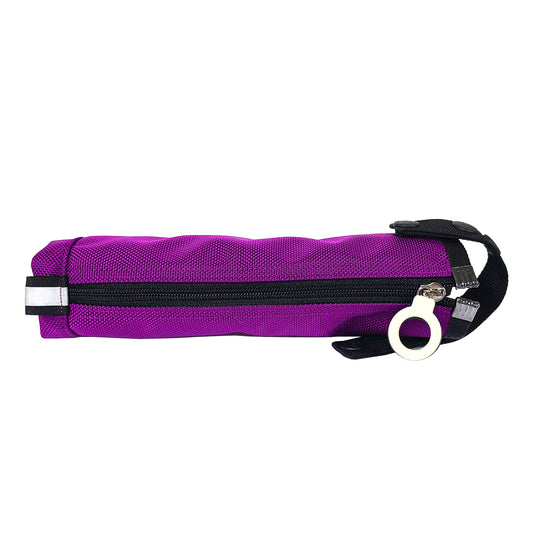 A horizontal purple Cane pouch junior with a black zipper down the middle with a white ring pull, and a black detchable handle at the top, and a reflective tag at the bottom.