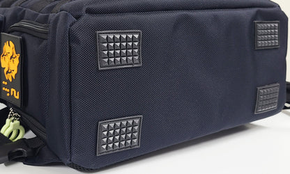 Details of the bottom of the bag showing 4 large rubber feet with bumpy texture for grip , stability, and protection from dirt and water.