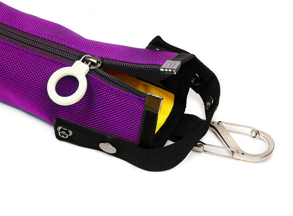 A dark purple cane pouch with a yellow lining and white zipper ring.