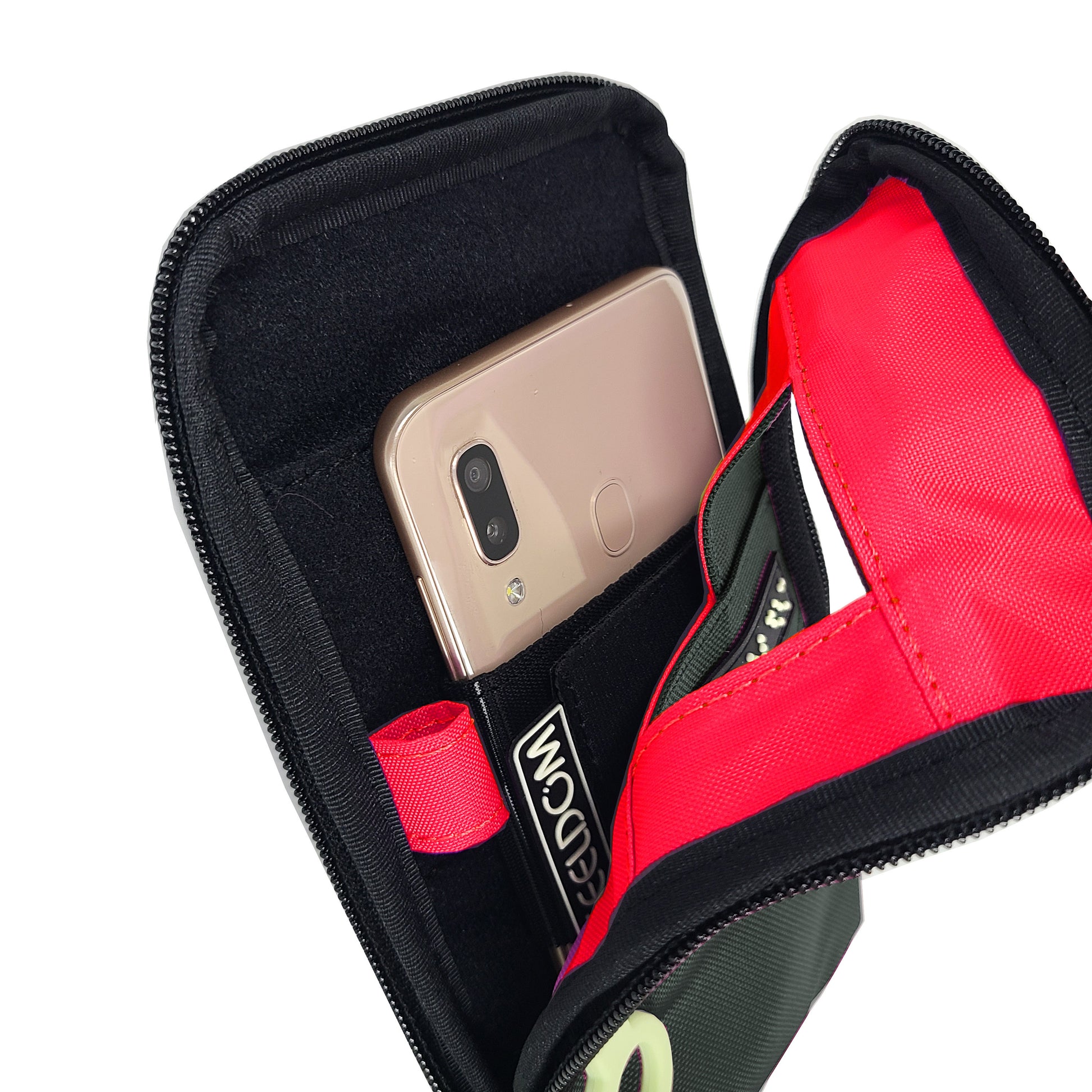 A Gray Navi Pal is zipped open showing a Neon Red lining, and a smartphone in its holster which is attached by velcro to the back side of the pouch. The phone's camera is front facing, lined up with the small window on the front of the pouch. There is a pen loop on the left inside of the pouch.