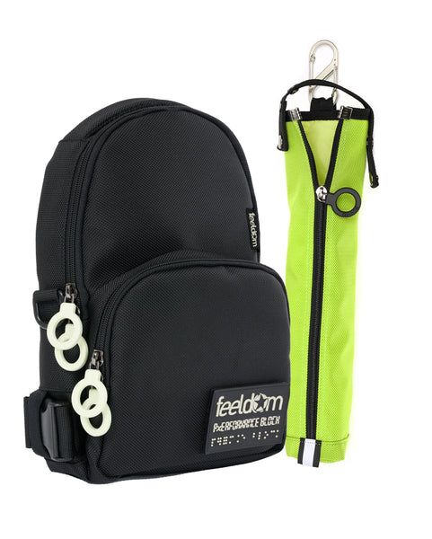 A black Jayu crossbody with white zipper rings. There is a bright yellow cane pouch (electric Kiwi)