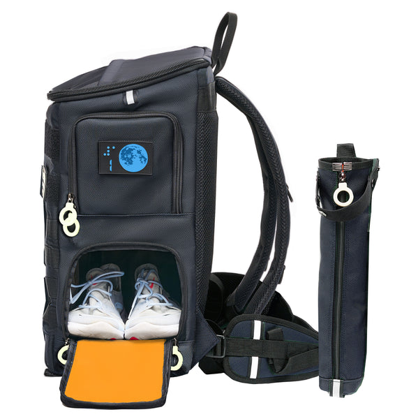 A large dark Navy blue backpack with two levels and side access doors on each level. Each door has a double white ring zipper and a bright colored braille design tactical patch with a number. The bottom door is open showing white tennis shoes insideThere is a navy blue cane pouch attached to the strap.