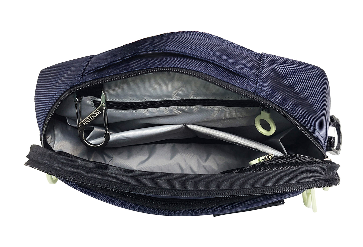 A Navy Blue Pouch with a handle on the top. Open, showing a silver lining and two padded pockets. On both sides are a zipper pouch with a white zipper ring.