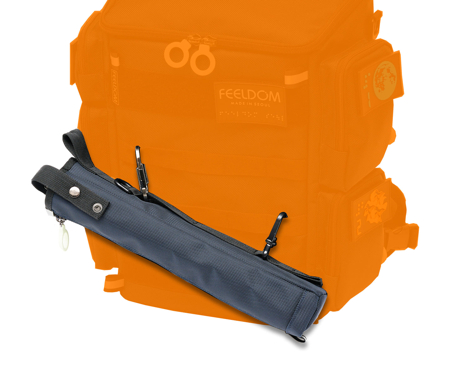 Close up detail of the cane pouch attached to the front of the backpack with 2 clips on the horizontal webbing straps.