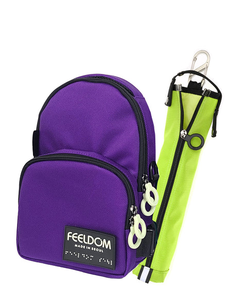 Dark purple Jayu Crossbody bag with the bright yellow (electric kiwi) cane pouch