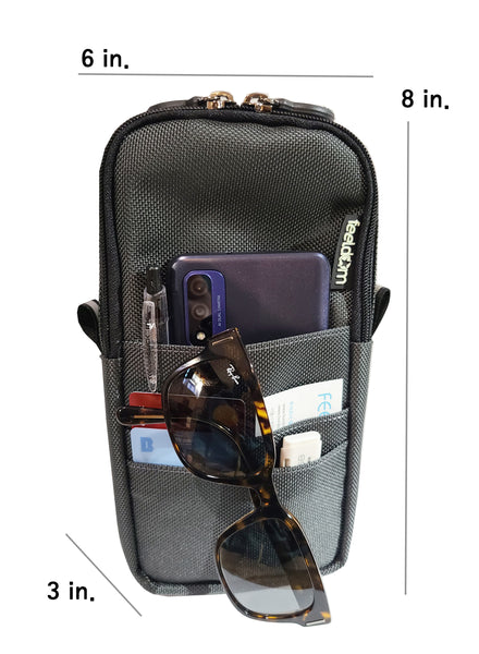 Quickie Pouch dimensions are 8 inches tall, 6 inches wide and to 3 inches thick, depending on how much you stuff into it. There is a phone and credit cards on the front pockets, with sunglasses hanging from the front pouch.