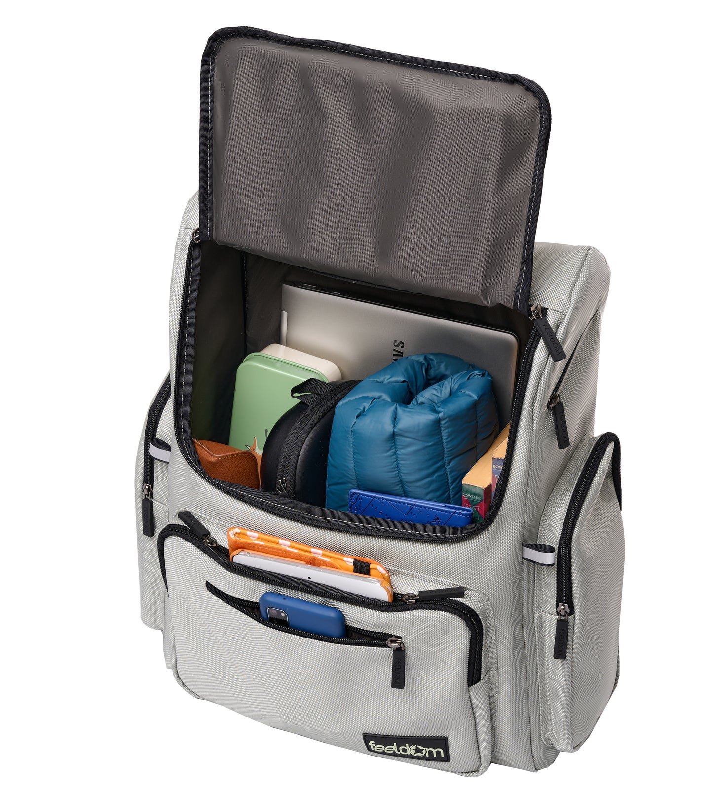 A large sturdy backpack that opens front-opening that unzips with a flip-up top. It has 6 outer zipper pockets and is filled with a jacket, books, phone, tablet, headphones, glasses, case and laptop computer.