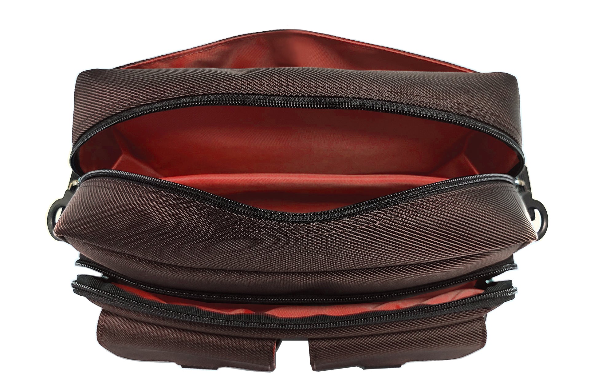 Inside Top view of the CHIC LT24 Small bag with a zip open pouch and a padded pouch inside for a small ipad or electronics. There is a mesh zipper pouch on the inside front which is not visible here. The front zipper pouch and the flat back pouch is also lined with a watermelon red lining, offering a nice contrast to the dark outer color.