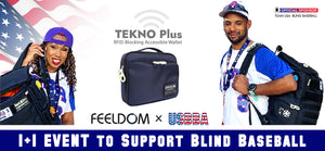 Two blind baseball players in blue and white uniforms carrying FEELDOM low vision backpacks and smiling. TEKNO Plus 1 plus 1 event to support blind baseball. FEELDOM Official Sponsor of Team USA