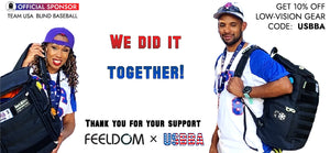 Two blind baseball players in blue and white uniforms holding Feeldom Backpacks. Text reads: We did it together. Thank you for your support. Feeldom with USBBA. Get 10% off low vision gear with discount code USBBA.