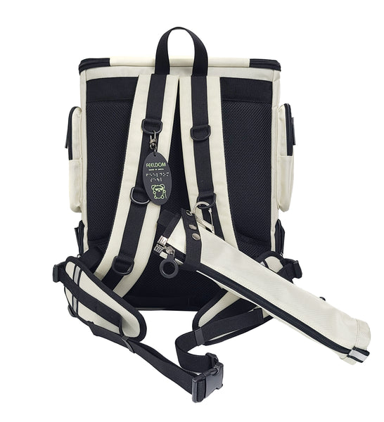 Back view of the White Performance Block Medium S-series showing the White cane pouch clipped to the strap D-ring with the carabiner, and the waist strap attached using two clip buckles on each side. The handle is a smooth nylon band along the top center of the bag.