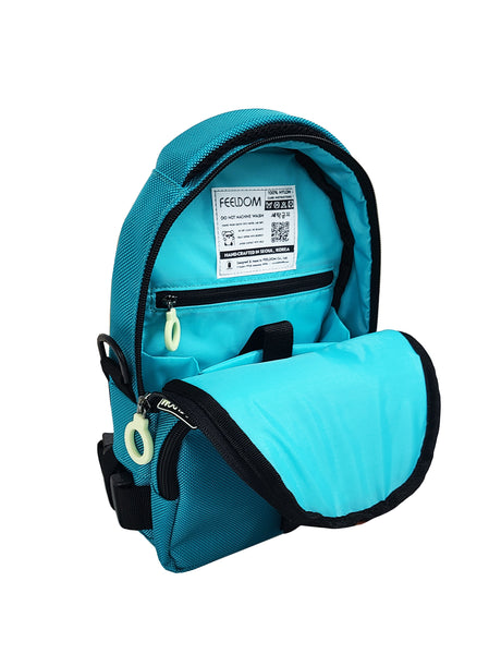 The lining of the Aqua Blue Crossbody bag shows light aqua blue inside, with a padded inner pouch and a small zipper pocket with a white ring pull. The care label is sewn inside, and it has a QR code for visually impaired persons