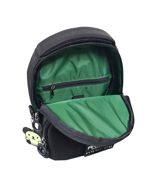 The lining of the Black Jade Crossbody bag shows a dark green inside, with a padded inner pouch and a small zipper pocket with a regular zipper pull.  A glow-in the dark Goldie Character keychain hangs from the side.