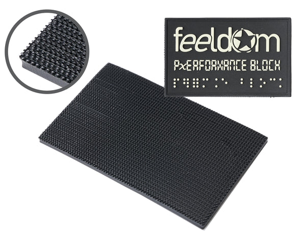 Feeldom and Performance block Logo white on a black rubber rectangular patch. Reverse detail shows the new type of velcro hooks which are stronger than the regular velcro.