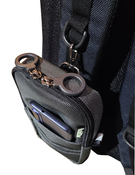 Top view of Quickie Pouch show the high-quality construction with premium double ring zippers. The pouch clips onto the D rings of the backpack straps. 