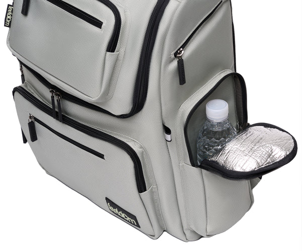 Star Backpack in Silver with opened side pockets.