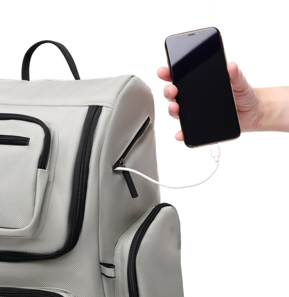 Star back pack in silver with the side zipper slot for tubes and cords access.