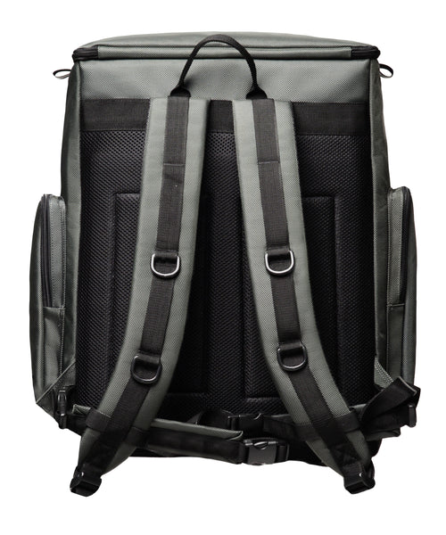 Back view of Feeldom Trek backpack. A padded air mesh rigid back panel, 5 inch top handle and padded straps with 3  D-rings on each strap. The removable waist belt is tucked behind.